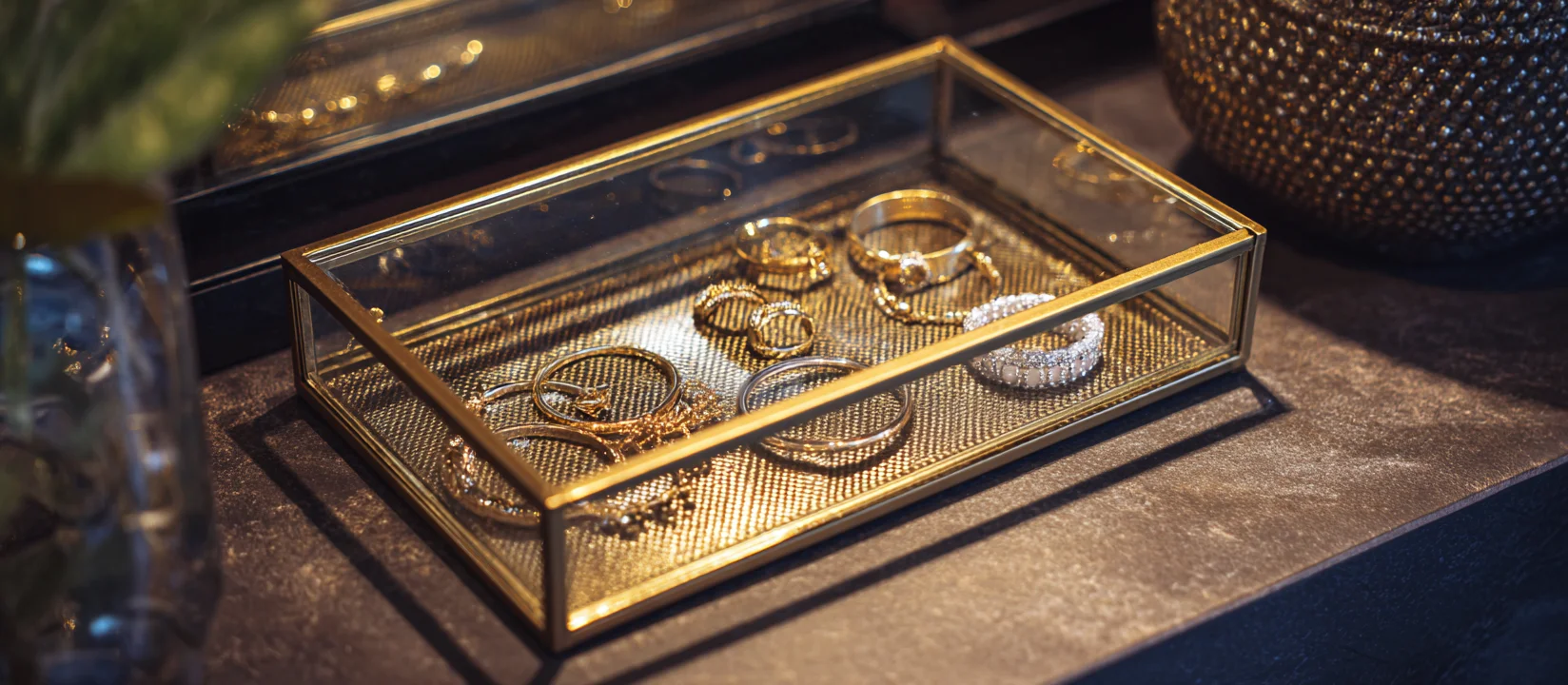 A metal design provides elegant jewelry stacking trays and jewelry stackable trays, complete with a helpful transparent lid.